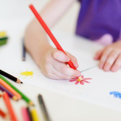 Child drawing a flower