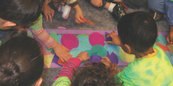 Children working on a stained glass project