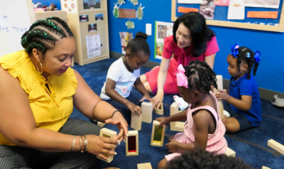 michelle kang and tonia durden visiting a center