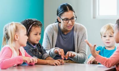 a teacher talking to students