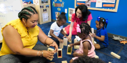 tonia durden and michelle kang visiting a center